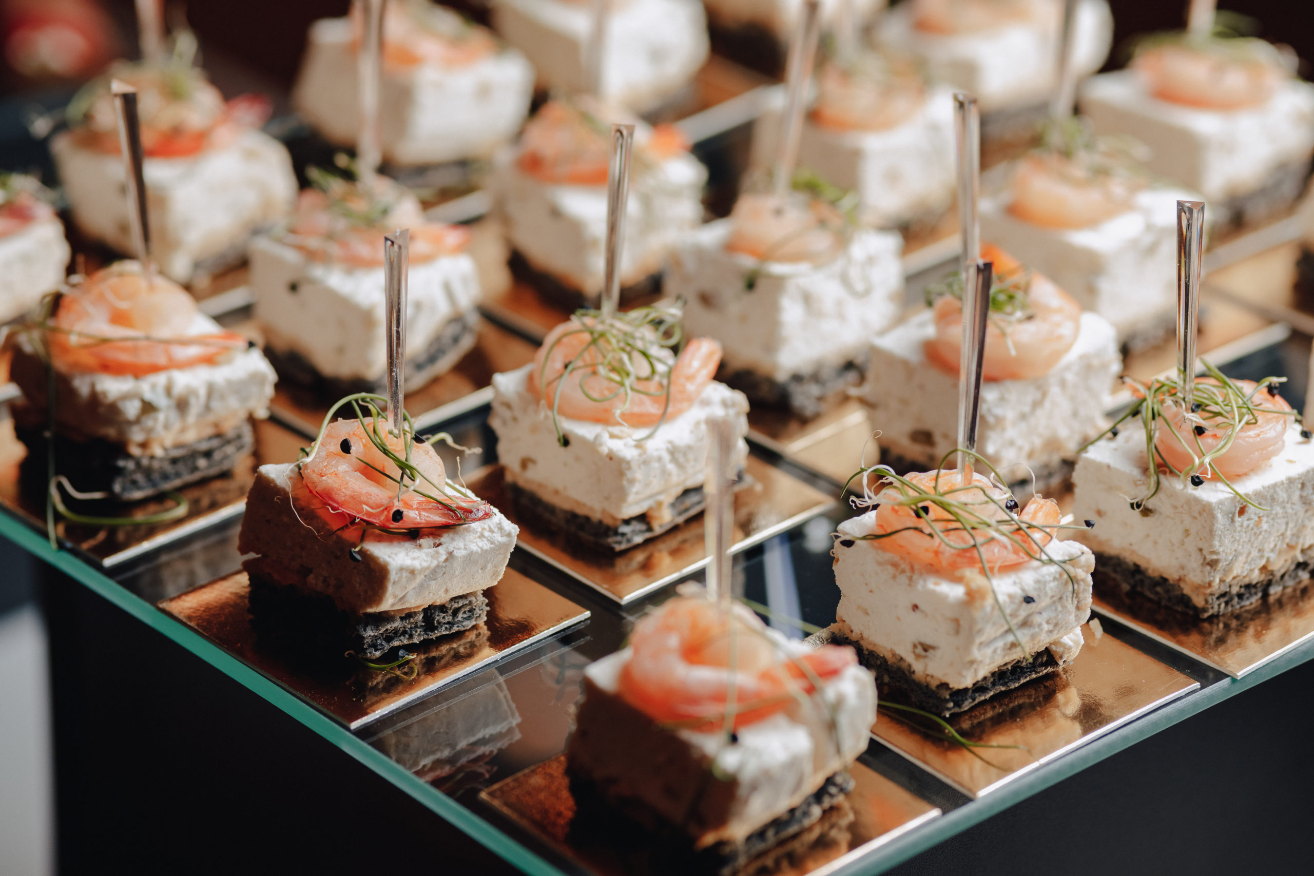 delicious festive buffet with canapes and different delicious meals scaled